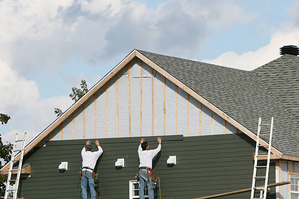 Professional Siding Contractor technician working in Marsteller, PA